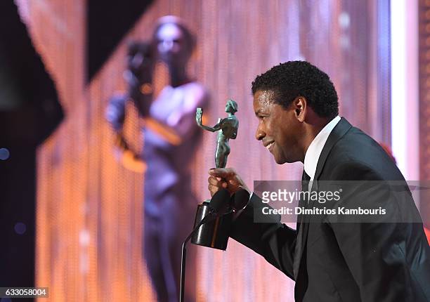 Actor Denzel Washington accepts the award for "A Male Actor in a Leading Role" onstage during The 23rd Annual Screen Actors Guild Awards at The...
