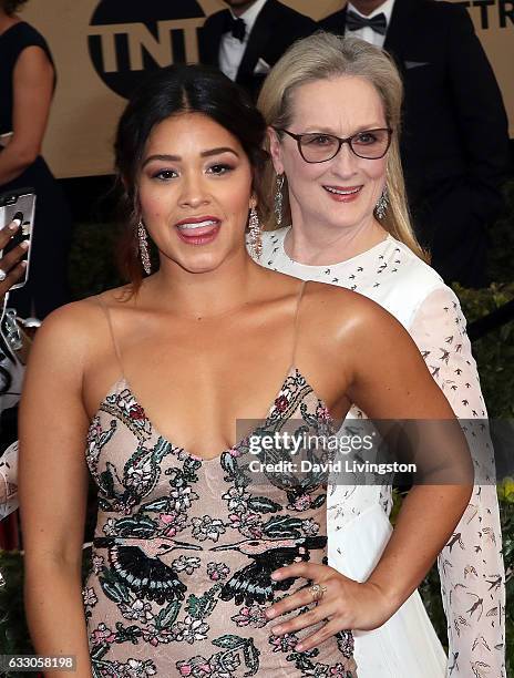 Actress Meryl Streep photobombs actress Gina Rodriguez at the 23rd Annual Screen Actors Guild Awards at The Shrine Expo Hall on January 29, 2017 in...