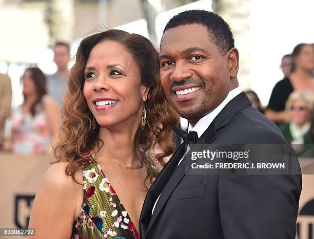 Actors Mykelti Williamson and Sondra Spriggs arrive for the 23rd Annual Screen Actors Guild Awards at the Shrine Exposition Center on January 29 in...