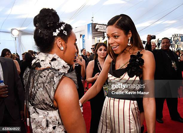 Actors Janelle Monae and Naomi Harris attend The 23rd Annual Screen Actors Guild Awards at The Shrine Auditorium on January 29, 2017 in Los Angeles,...