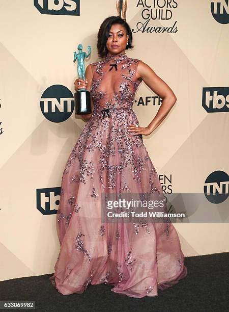 Actress Taraji P. Henson, recipient of the Outstanding Performance by a Cast in a Motion Picture award for 'Hidden Figures,' pose in the press room...