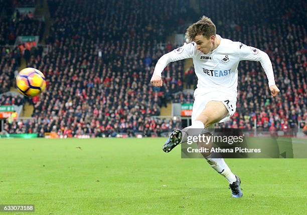 Tom Carroll of Swansea City crosses the ball into the box for Fernando Llorente of Swansea City to score Swanseas second goal of the Premier League...