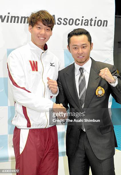 Ippei Watanabe and Kosuke Kitajima pose for photographs at the award ceremony during day two of the Kosuke Kitajima Cup Tokyo Swimming Championships...
