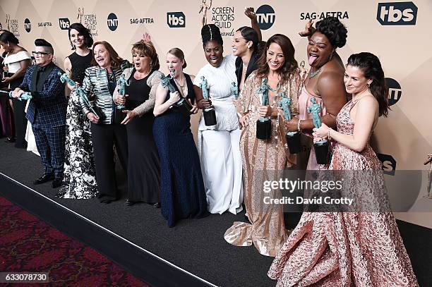 Orange Is the New Black' cast members, winners of the Outstanding Performance by an Ensemble in a Comedy Series award, pose in the press room at the...