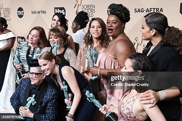 Orange Is the New Black' cast members, winners of the Outstanding Performance by an Ensemble in a Comedy Series award, pose in the press room at the...