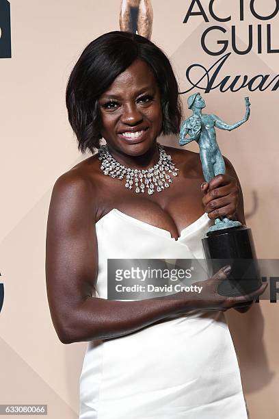 Actress Viola Davis, winner of the Outstanding Performance by a Female Actor in a Supporting Role award for 'Fences', poses in the press room at the...