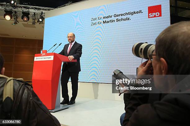 Martin Schulz, the Social Democrat Party candidate for German Chancellor, poses for photographers ahead of a news conference at the SPD headquarters...
