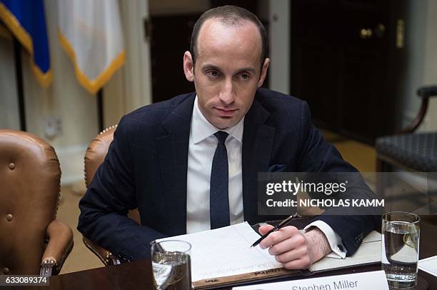 White House Senior Adviser Stephen Miller attends a meeting between US President Donald Trump and small business leaders in the Roosevelt Room at the...