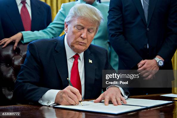 President Trump Signs Executive Order In Oval Office Of The White House President Trump Signs Executive Order In Oval Office Of The White House