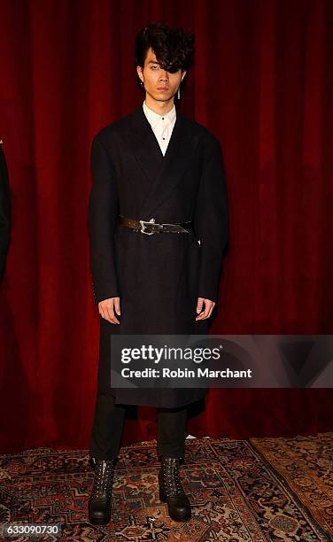 Model poses at Kozaburo Presentation during NYFW: Men's on January 30, 2017 in New York City.