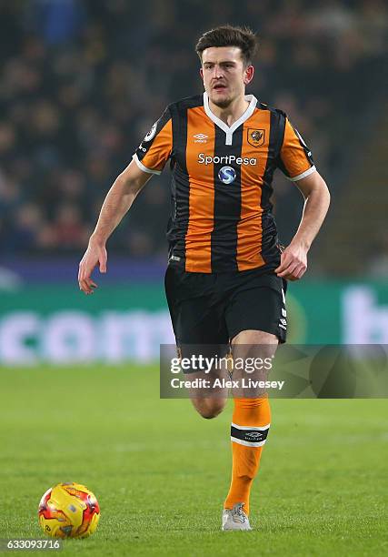 Harry Maguire of Hull City runs with the ball during the EFL Cup Semi-Final: Second Legat KCOM Stadium on January 26, 2017 in Hull, England.