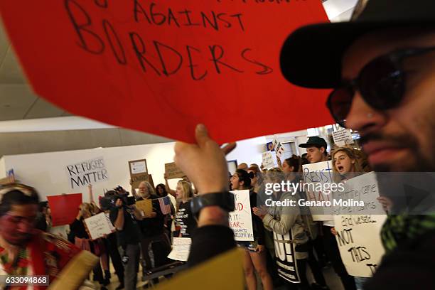 People continue to protest President TrumpÃ¢â¬â¢s travel ban at the Tom Bradley Terminal at LAX on January 29, 2017 in Los Angeles, California....