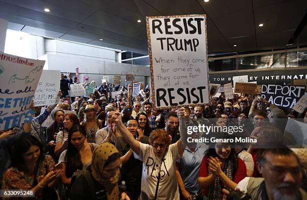 Hundreds of people continue to protest President Donald Trump's travel ban at the Tom Bradley International Terminal at LAX on January 29, 2017 in...