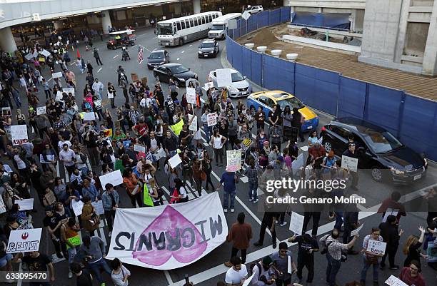 Protesters take over the road on the lower deck of the Tom Bradley International Terminal at LAX on January 29, 2017 in Los Angeles, California.