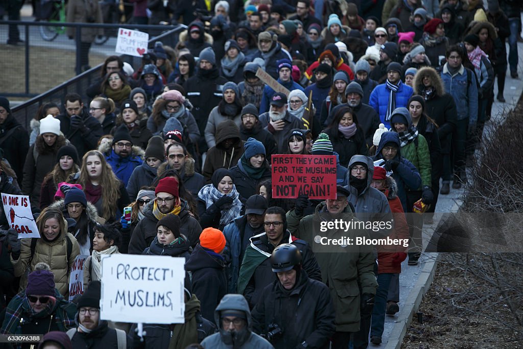 Demonstrators Protest President Trump's Travel Ban Outside Of The U.S. Consulate