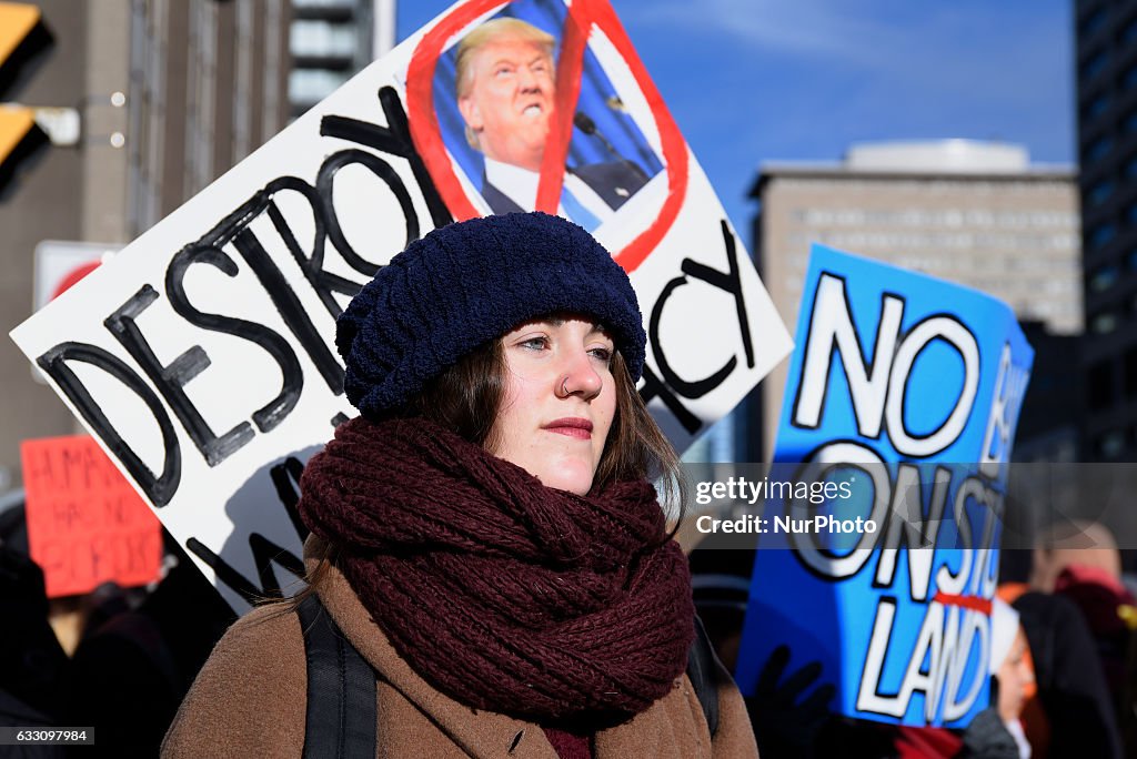 Demonstrators Protest President Trump's Travel Ban Outside Of The U.S. Consulate