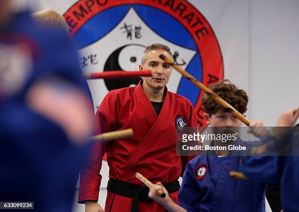 Founder Mark DiNino watches over a class at American Kempo Karate Academy in Hanson, MA on Jan. 18, 2017.