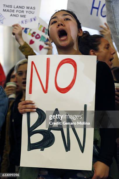 Serena Koo joins people who continue to protest President Trump's travel ban at the Tom Bradley Terminal at LAX on January 29, 2017 in Los Angeles,...