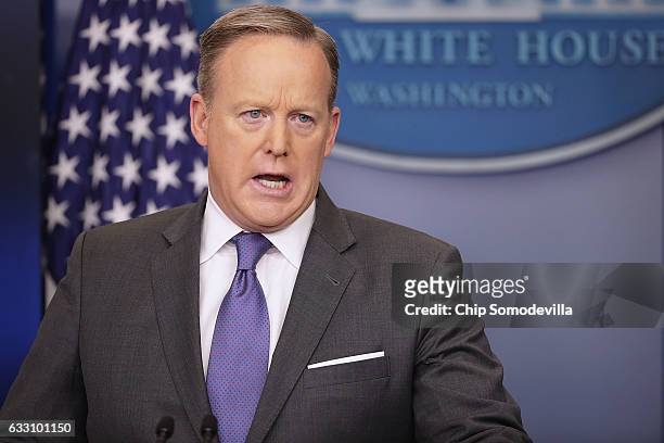 White House Press Secretary Sean Spicer reacts to reporters' questions in the Brady Press Briefing Room at the White House January 30, 2017 in...