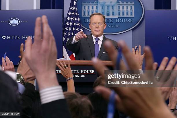 White House Press Secretary Sean Spicer reacts to reporters' questions in the Brady Press Briefing Room at the White House January 30, 2017 in...