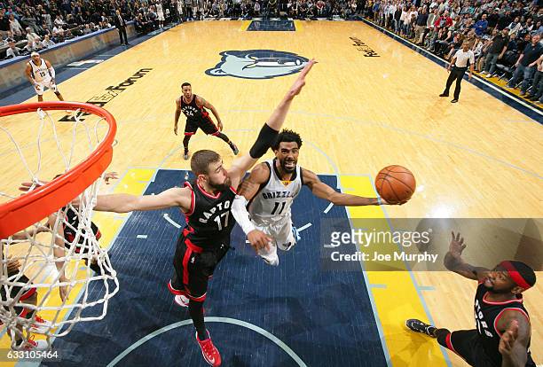 Mike Conley of the Memphis Grizzlies drives to the basket against the Toronto Raptors on January 25, 2017 at FedExForum in Memphis, Tennessee. NOTE...