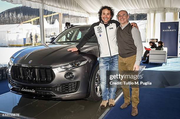 Ski star Giorgio Rocca and Maserati Switzerland CEO Piergiorgio Cecco pose near a Maserati Levante during Snow Polo World Cup St. Moritz 2017 on...