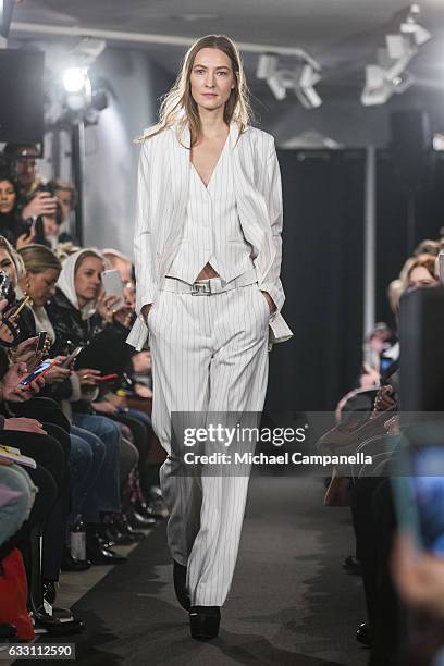 Model walks the runway at the J. Lindeberg show during the Stockholm Fashion Week Autumn/Winter 2017 at the J. Lindeberg store on January 30, 2017 in...