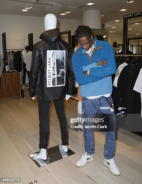 Travis Scott appears at Barneys New York in Beverly Hills to view his Helmut Lang X Travis Scott collection at Barneys New York on January 30, 2017...