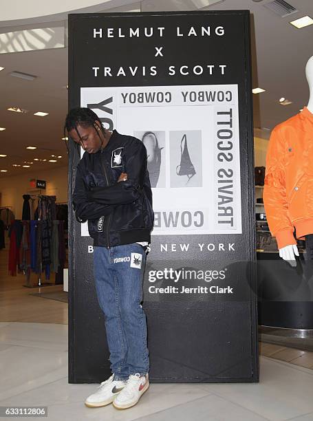 Travis Scott appears at Barneys New York in Beverly Hills to view his Helmut Lang X Travis Scott collection at Barneys New York on January 30, 2017...