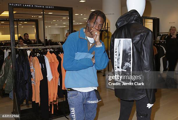 Travis Scott appears at Barneys New York in Beverly Hills to view his Helmut Lang X Travis Scott collection at Barneys New York on January 30, 2017...