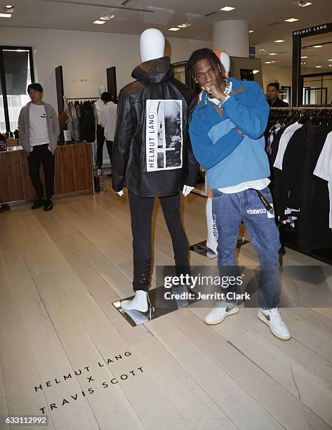 Travis Scott appears at Barneys New York in Beverly Hills to view his Helmut Lang X Travis Scott collection at Barneys New York on January 30, 2017...