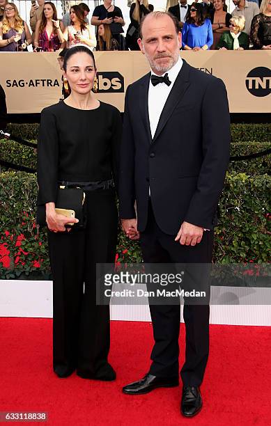 Tamara Malkin-Stuart and actor Nick Sandow arrive at the 23rd Annual Screen Actors Guild Awards at The Shrine Expo Hall on January 29, 2017 in Los...