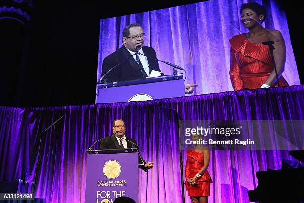 Hosts, author and academic Michael Eric Dyson and news anchor Tamron Hall speak onstage during the National CARES Mentoring Movements 2nd Annual...