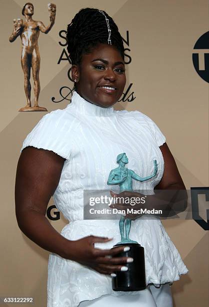 Danielle Brooks poses in the press room with her award for Outstanding Performance by an Ensemble in a Comedy Series for 'Orange Is The New Black' at...