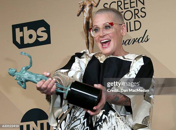 Lori Petty poses in the press room with her award for Outstanding Performance by an Ensemble in a Comedy Series for 'Orange Is The New Black' at the...