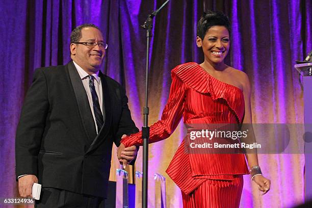 Hosts, author and academic Michael Eric Dyson and news anchor Tamron Hall speak onstage during the National CARES Mentoring Movements 2nd Annual...