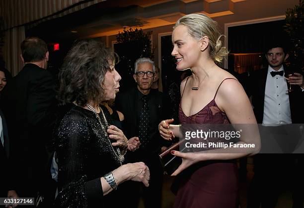 Actors Lily Tomlin and Taylor Schilling attend The Weinstein Company & Netflix's 2017 SAG After Party in partnership with Absolut Elyx at Sunset...
