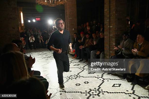 Fashion designer Billy Reid walks the runway at the Billy Reid Autumn/Winter 2017 show at The Cellar at The Beekman on January 30, 2017 in New York...