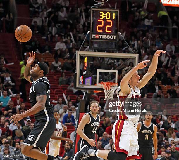 Miami Heat's Goran Dragic misses a pass that is caught by Brooklyn Nets' Trevor Booker in the second period on Monday, Jan. 30, 2017 at the...