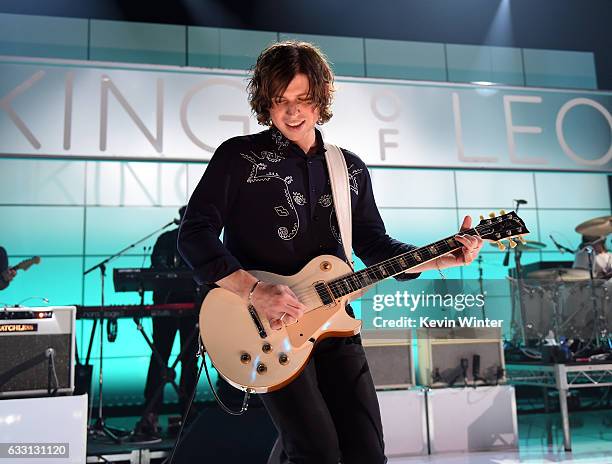 Matthew Followill of Kings Of Leon performs on stage on AT&T at iHeartRadio Theater LA on January 30, 2017 in Burbank, California.