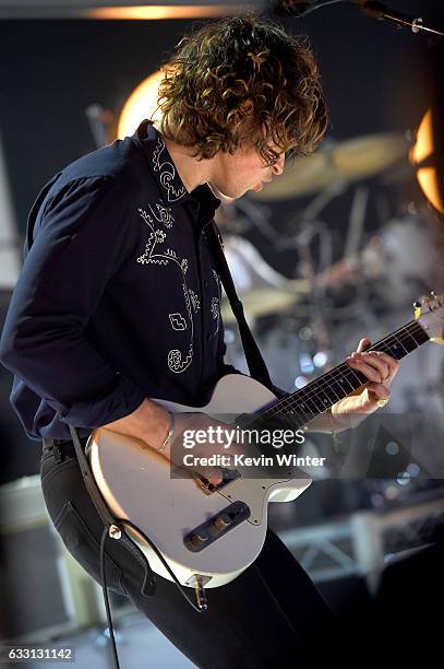 Matthew Followill of Kings Of Leon performs on stage on AT&T at iHeartRadio Theater LA on January 30, 2017 in Burbank, California.