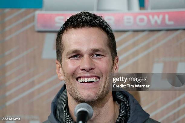 Tom Brady of the New England Patriots speaks with the media during Super Bowl 51 Opening Night at Minute Maid Park on January 30, 2017 in Houston,...