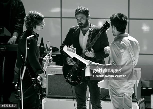 Matthew Followill, Caleb Followill and Jared Followill of Kings Of Leon perform on stage on AT&T at iHeartRadio Theater LA on January 30, 2017 in...