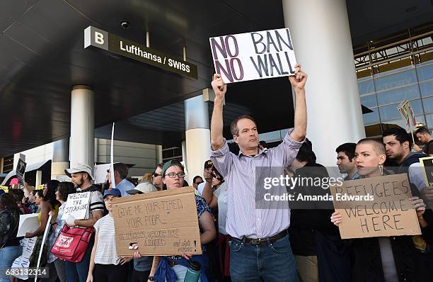 Protesters rally against the Muslim immigration ban imposed by U.S. President Donald Trump at Los Angeles International Airport on January 29, 2017...