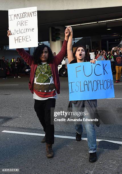 Protesters rally against the Muslim immigration ban imposed by U.S. President Donald Trump at Los Angeles International Airport on January 29, 2017...