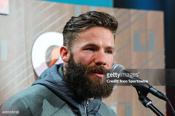 New England Patriots wide receiver Julian Edelman answers questions during Super Bowl Opening Night on January 30 at Minute Maid Park in Houston,...