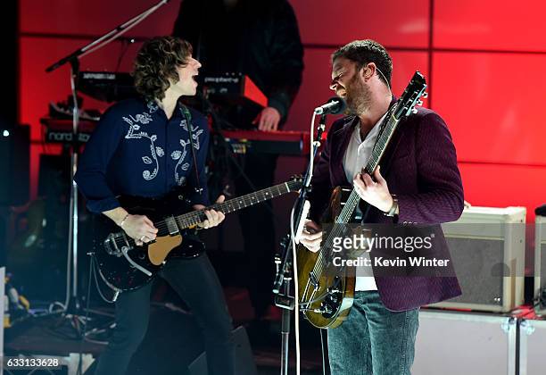 Matthew Followill and Caleb Followill of Kings Of Leon perform on stage on AT&T at iHeartRadio Theater LA on January 30, 2017 in Burbank, California.