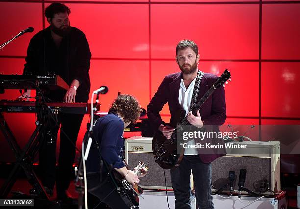 Matthew Followill and Caleb Followill of Kings Of Leon perform on stage on AT&T at iHeartRadio Theater LA on January 30, 2017 in Burbank, California.