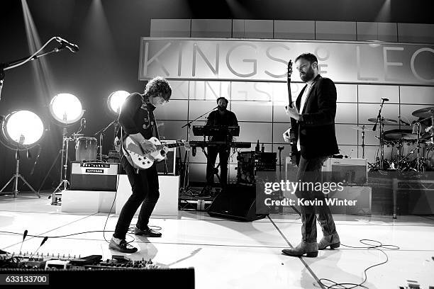 Matthew Followill and Caleb Followill of Kings Of Leon perform on stage on AT&T at iHeartRadio Theater LA on January 30, 2017 in Burbank, California.