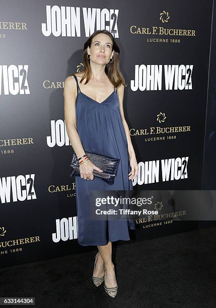 Actress Claire Forlani attends the premiere of 'John Wick: Chapter 2' sponsored by Carl F. Bucherer at ArcLight Hollywood on January 30, 2017 in...